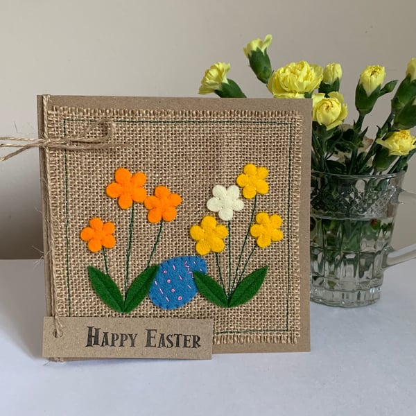 Easter greeting card with spring flowers and blue egg. Handmade. Wool felt.