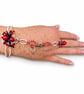 Red Spider Hand Chain – Beaded Ring and Bracelet - Image 1