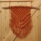 Medium orange macrame wall hanging