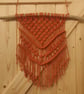 Medium orange macrame wall hanging - Image 1