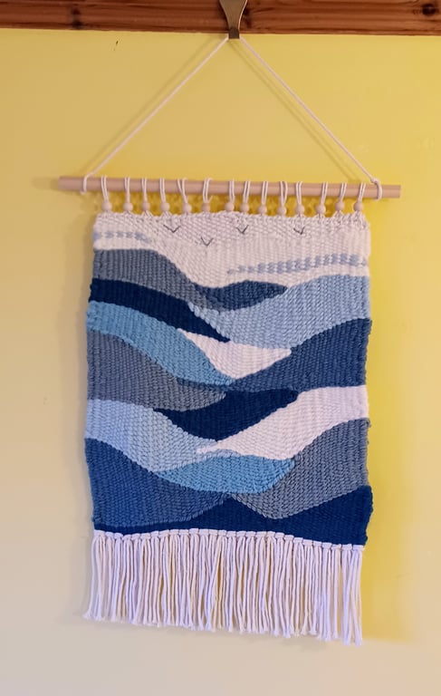Woven wall hanging with sea, waves and seagulls