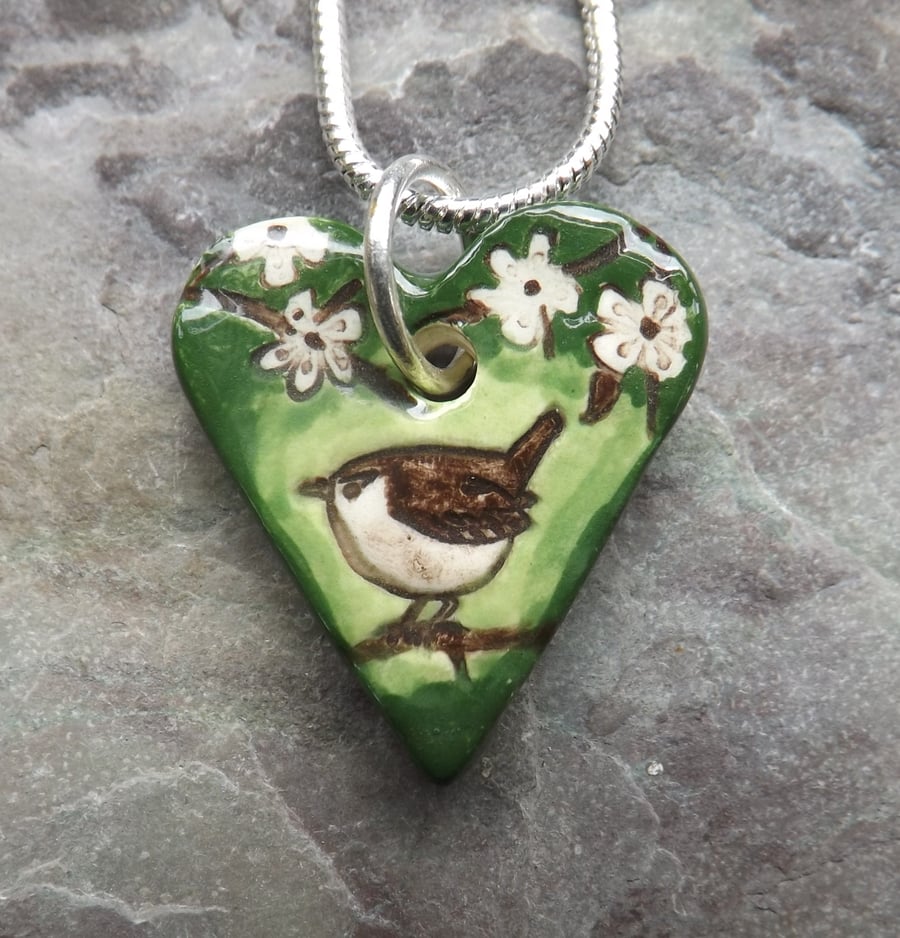 Heart shaped ceramic Wren in the Blackthorn pendant in green