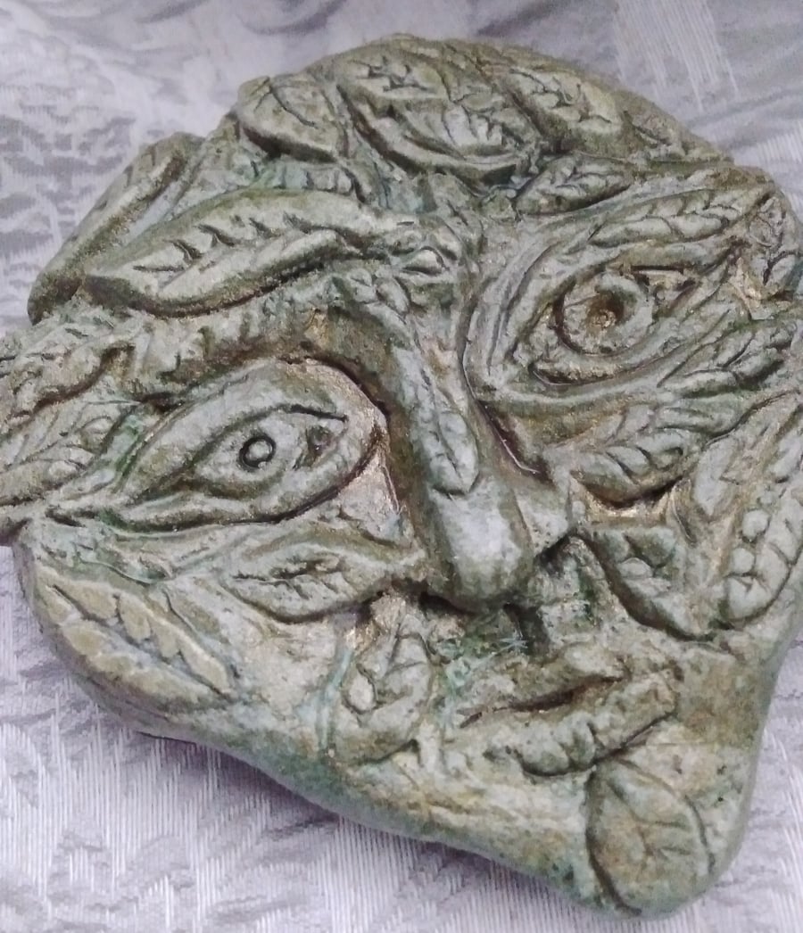 Pointy-chinned Green Man carving
