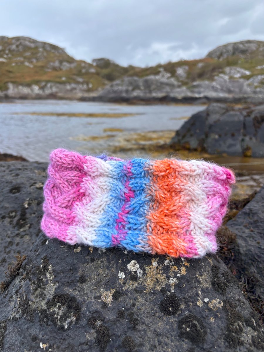 Hand knitted wool headband featuring Celtic knot pattern. Lined. CANDY