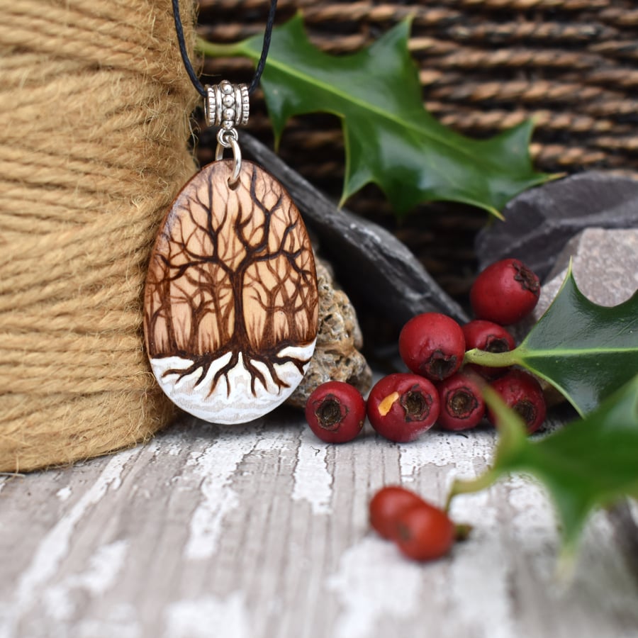 Winter woodland. Pyrography nature inspired wooden trees pendant.