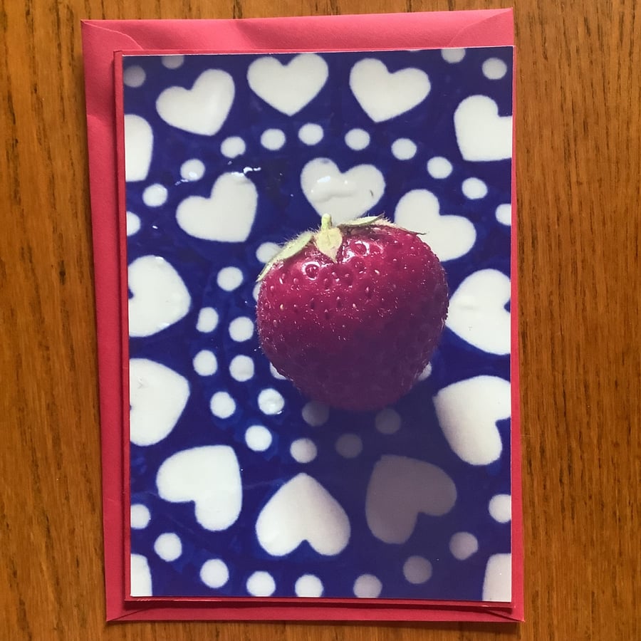 Handmade original photo card of the strawberry harvest on a decorative plate