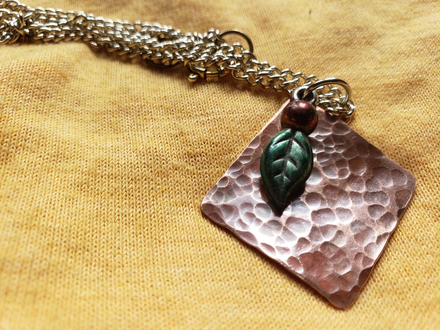 Hammered copper & leaf pendant
