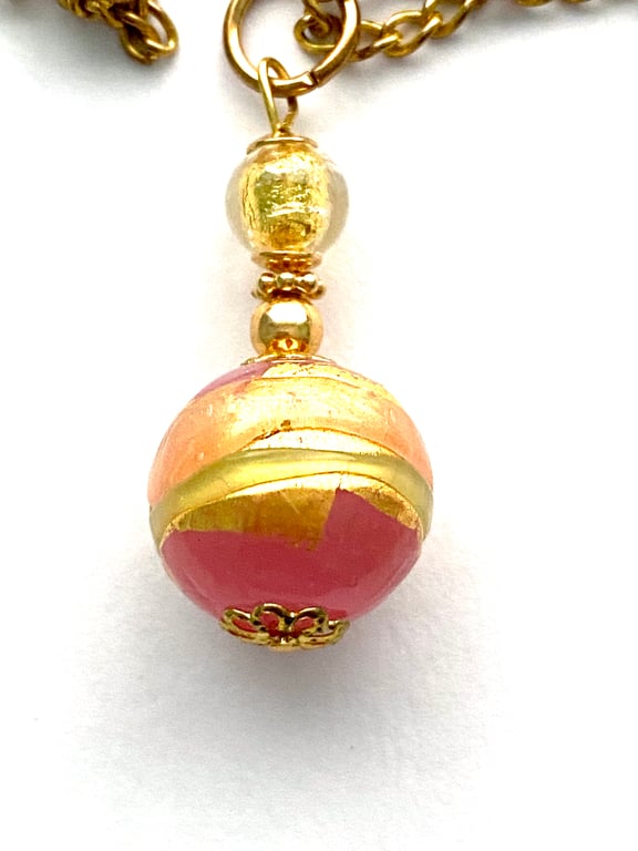 Gold Murano glass handmade rose decorated heart pendant with gold chain.