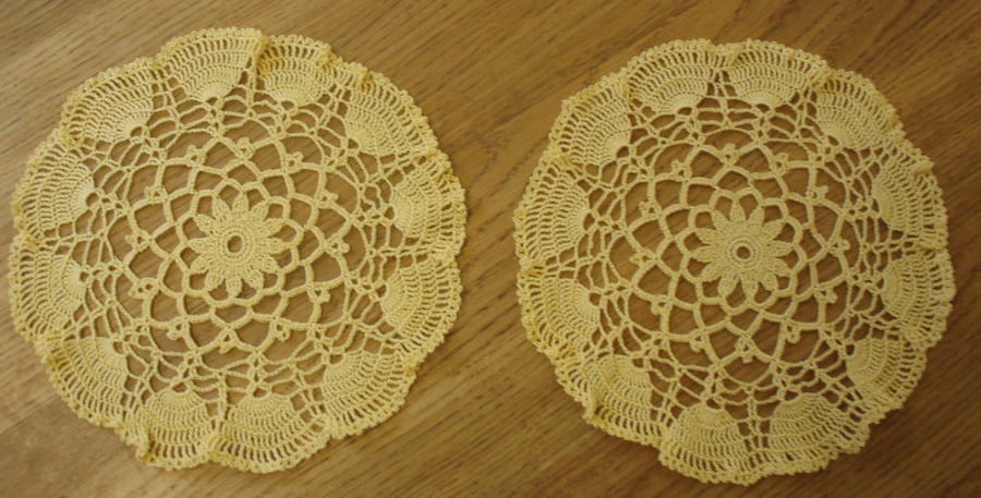 2 HAND CROCHETED COTTON TABLE MATS - IN A BRIGHT GOLD DESIGN - 23cm