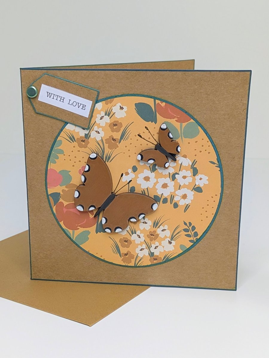 Handmade floral card with wooden butterfly embellishments, blank for own message