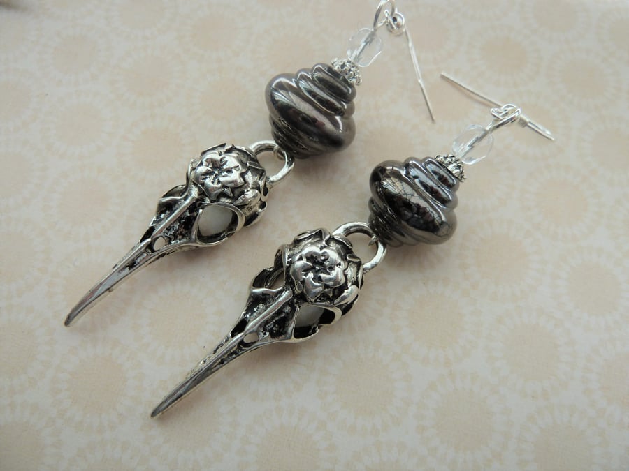 handmade lampwork bird skull earrings