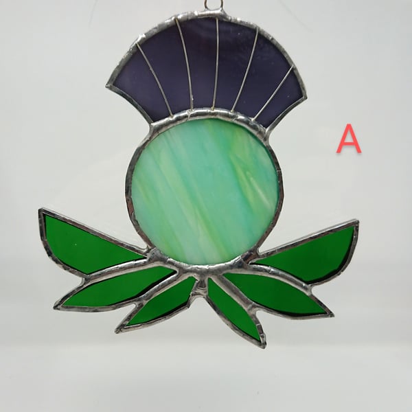 Stained glass Scottish Celtic thistle green and purple suncatcher decoration. 