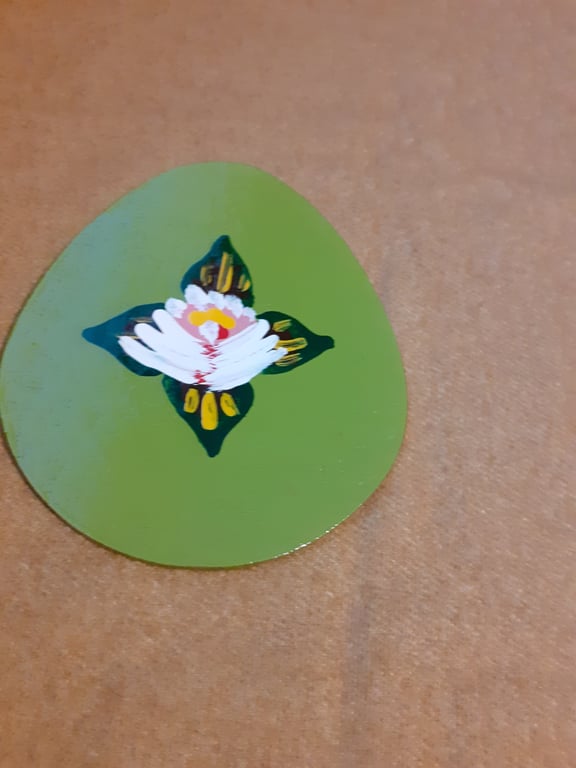 Egg shaped wooden magnet with canal art style rose