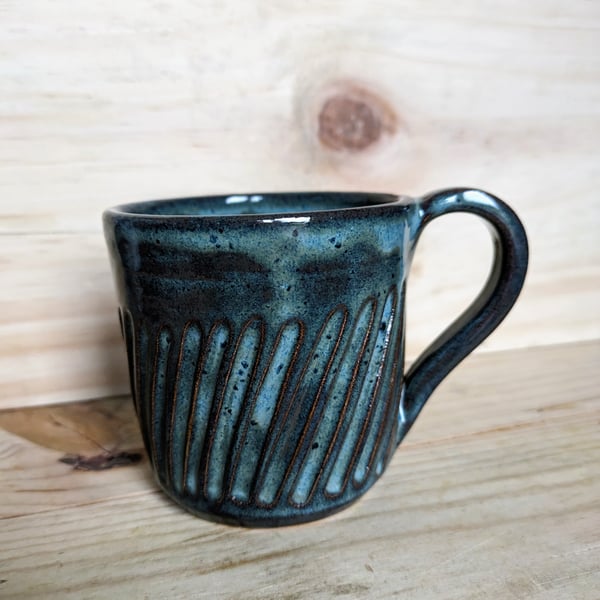 Dark greeny blue carved mug