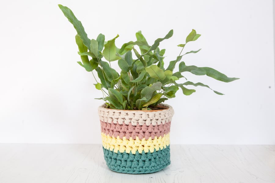 Medium plant pot cover in stripes. Made from recycled cotton. 
