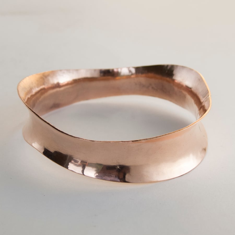 Anticlastic copper bangle