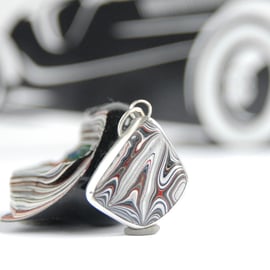 Fordite pendant