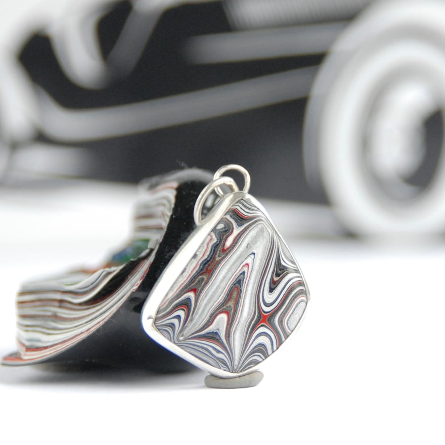 Freeform Fordite pendant - silver and grey