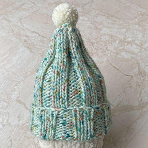Hand knitted child size bobble hat
