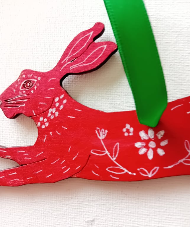 Scarlet hare  with white patterns