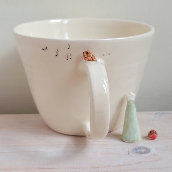 Handmade ceramic robin cup with bird prints and musical notes Pottery gift idea