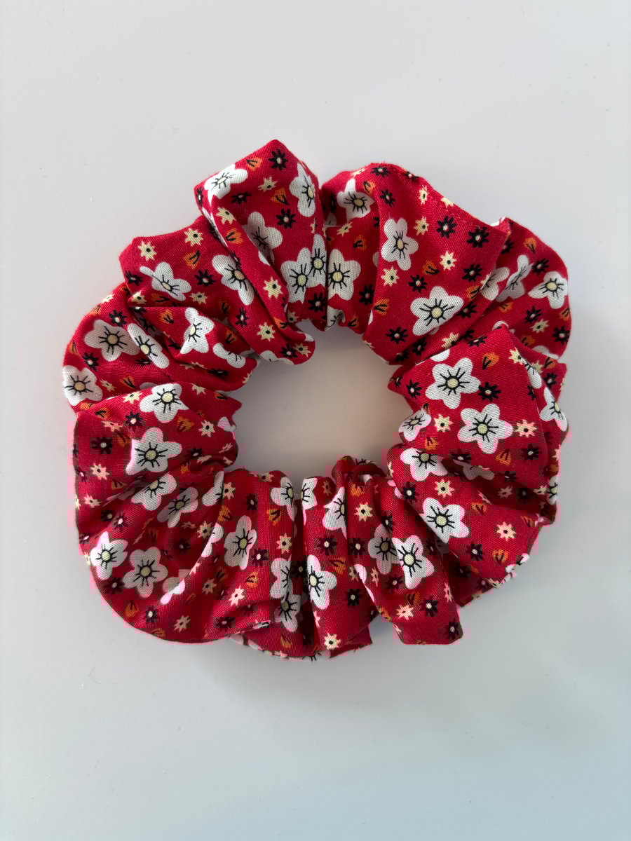 Cotton scrunchie hair accessory in a red and white floral print.