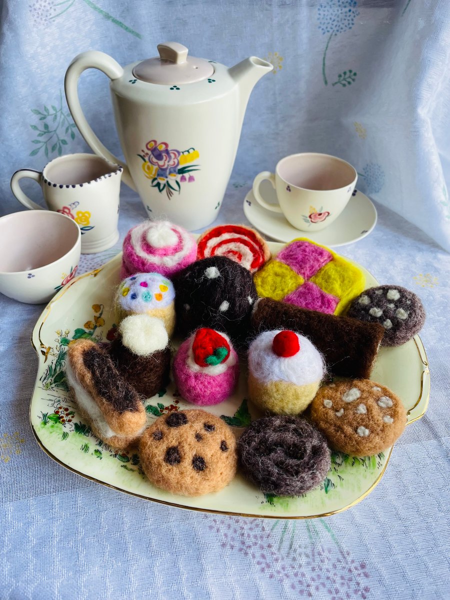 Needle felted Swiss roll slice