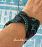 Flat twist wrist band bracelet