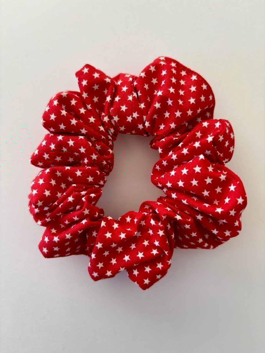 Cotton scrunchie hair accessory in fun festive print in red with white stars