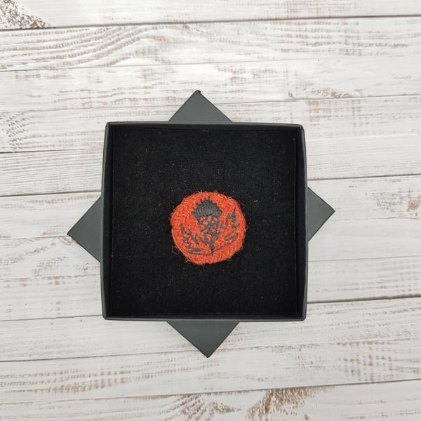 Embroidered thistle brooch in burnt orange tweed