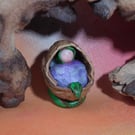 Tiny Baby Gnome 'Cimmi' in walnut shell crib OOAK by Ann Galvin