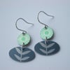 Folk art flower earrings in bright green and grey