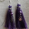 Beautiful purple tassel earrings with stars.