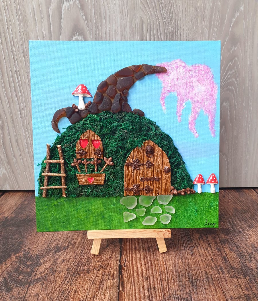 Whimsical seaglass fairy house