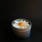 The Petty Soy Daisy Candle in the tin gold or silver 