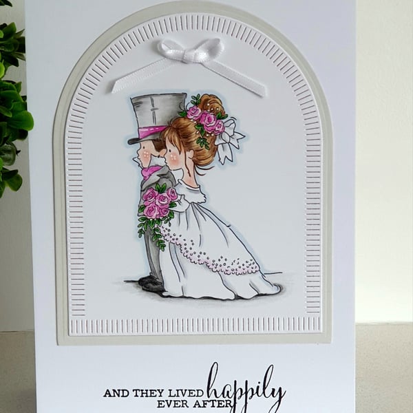 Wedding day card with cute bride and groom and pink flowers