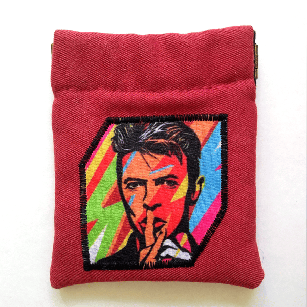 Earbud pouch or coin purse featuring musical legend