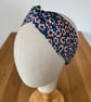 Cotton headband, twist knot style hairband in blue with a daisy floral print. - Image 2