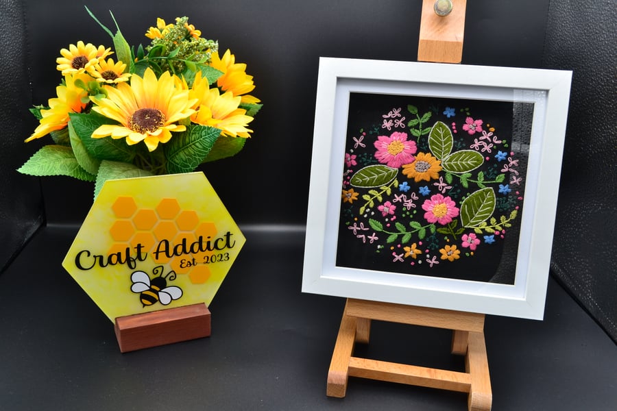 Framed hand stitched artwork