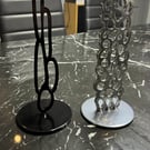 Luxury modern and contemporary contrasting pair of candle holders