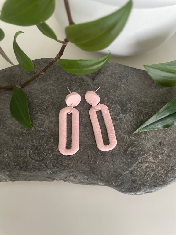 Statement earrings in pale pink 