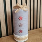 Light grey yarn and jute wrapped vase