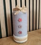 Light grey yarn and jute wrapped vase