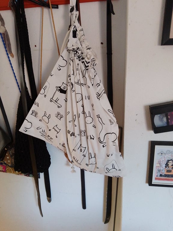 Handmade cotton laundry bag with drawstring closure