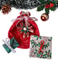 Reusable fabric Christmas gift bag set.