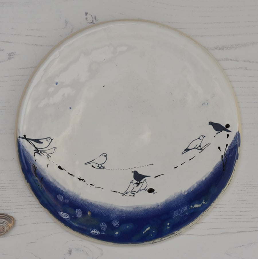 Birds on a wire blue and white round rimless plate - handmade pottery