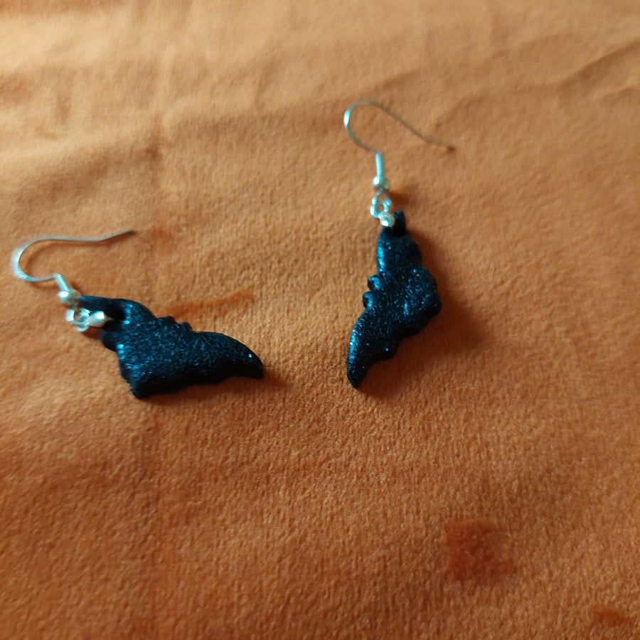 Black glittery bat earrings 