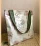 Oilcloth tote bag with recessed zip in Pink Orchard