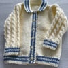 Cream cardigan with cable sleeves