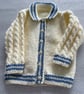 Cream cardigan with cable sleeves